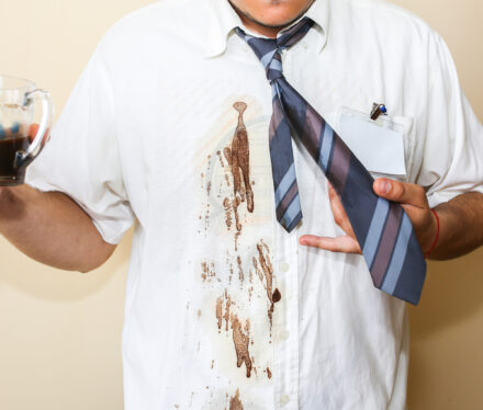 office-worker-spills-coffee-on-white-shirt-occupa-2026-03-26-04-03-13-utc